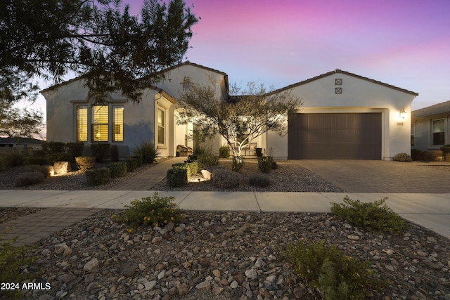 view of front of property with a garage