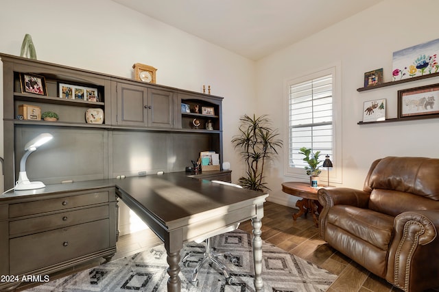 home office featuring dark hardwood / wood-style flooring