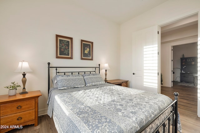 bedroom with light hardwood / wood-style floors