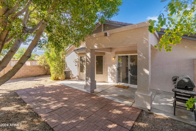 rear view of house featuring a patio area