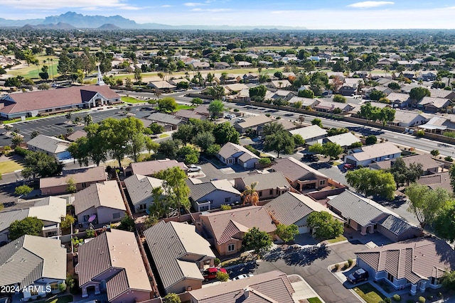 birds eye view of property featuring a mountain view