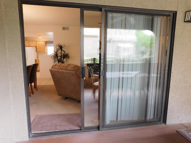 interior space featuring a balcony and visible vents