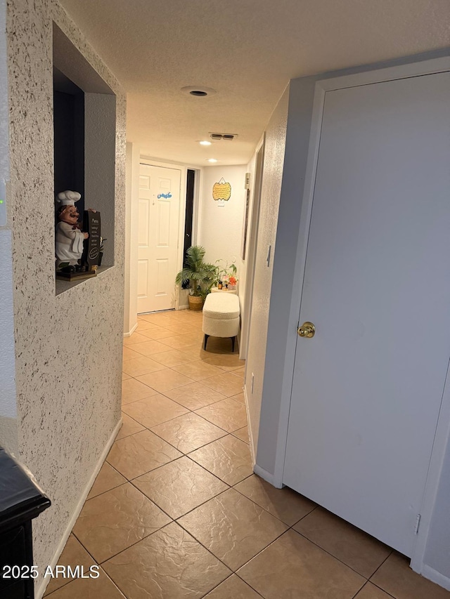 9060 N 47th Ln, Glendale, AZ 85302 - hallway with baseboards and light tile patterned flooring