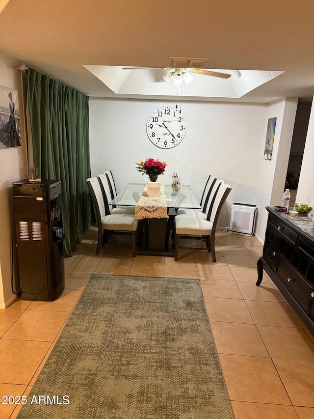 9060 N 47th Ln, Glendale, AZ 85302 - dining area with a skylight, light tile patterned floors, and a ceiling fan