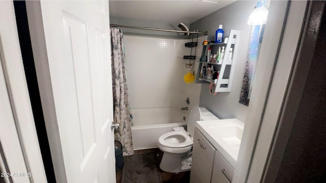 full bathroom featuring shower / tub combo with curtain, vanity, and toilet