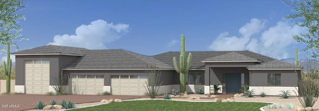 1906 E Cloud Rd, Phoenix, AZ 85086 - view of front of property featuring a garage, stucco siding, driveway, and a front lawn
