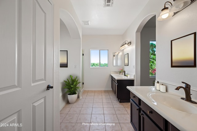 16914 E Britt Ct, Fountain Hills, AZ 85268 - full bathroom with tile patterned floors, visible vents, two vanities, and a sink