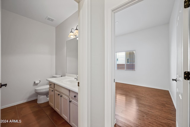 16914 E Britt Ct, Fountain Hills, AZ 85268 - half bath with toilet, visible vents, vanity, and baseboards