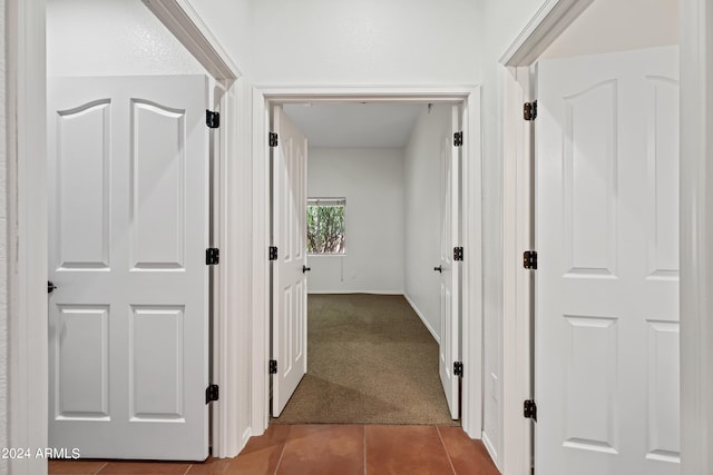 16914 E Britt Ct, Fountain Hills, AZ 85268 - hallway with baseboards, tile patterned flooring, and carpet flooring