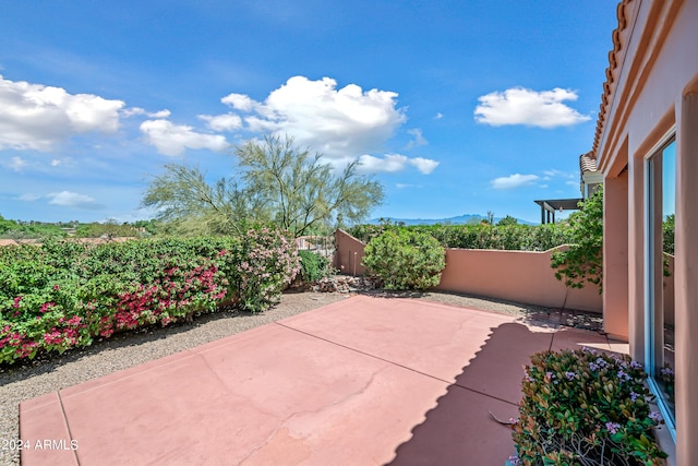 16914 E Britt Ct, Fountain Hills, AZ 85268 - view of patio with a mountain view and a fenced backyard
