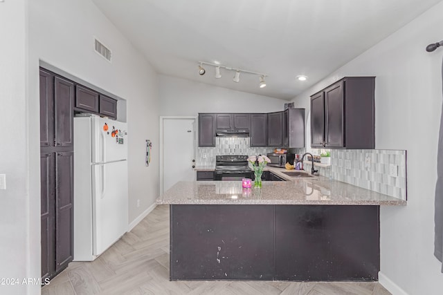 kitchen with kitchen peninsula, vaulted ceiling, sink, white fridge, and black / electric stove