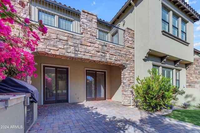 rear view of house featuring a patio area