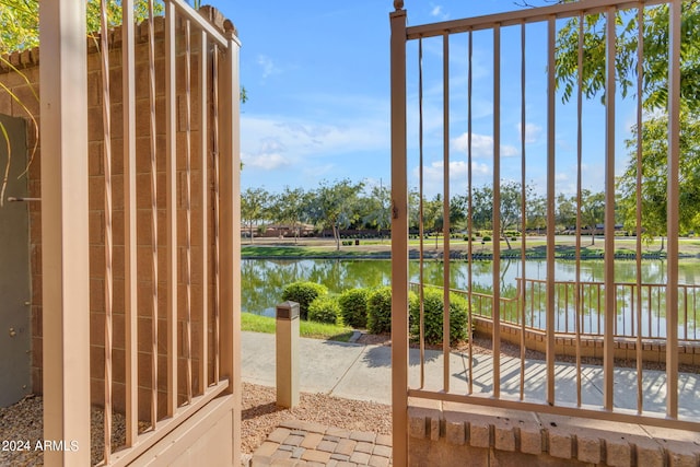 doorway to outside featuring a water view