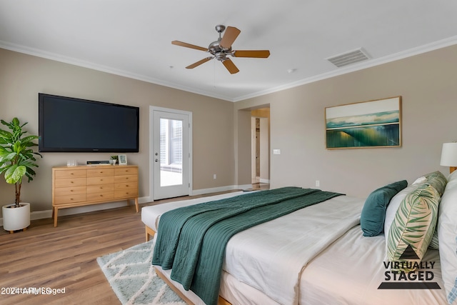 bedroom featuring wood-type flooring, ornamental molding, access to outside, and ceiling fan