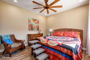 7409 E Weaver Way, Prescott Valley, AZ 86314 - bedroom with wood finished floors, recessed lighting, and ceiling fan