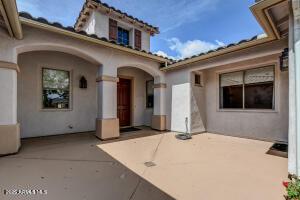 7409 E Weaver Way, Prescott Valley, AZ 86314 - back of house with stucco siding and a patio
