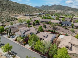 7409 E Weaver Way, Prescott Valley, AZ 86314 - aerial perspective of suburban area featuring a mountainous background