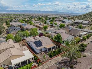 7409 E Weaver Way, Prescott Valley, AZ 86314 - aerial view of residential area with a mountain backdrop