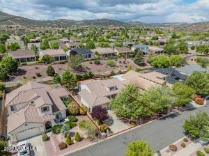 7409 E Weaver Way, Prescott Valley, AZ 86314 - aerial perspective of suburban area featuring a mountainous background