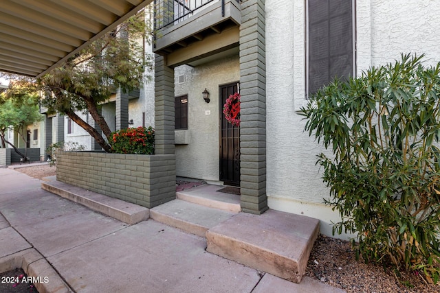 doorway to property with a balcony