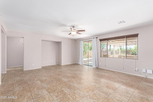 19319 E Thornton Rd, Queen Creek, AZ 85142 - empty room with ceiling fan, baseboards, and light tile patterned flooring
