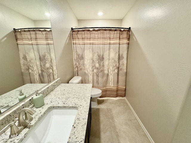 bathroom featuring vanity, tile patterned floors, toilet, and a shower with shower curtain