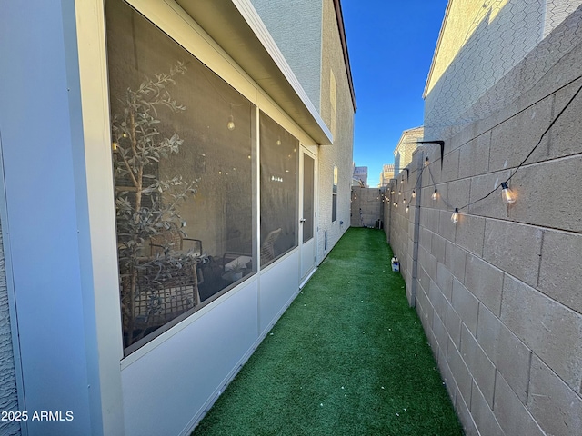 view of home's exterior featuring a lawn