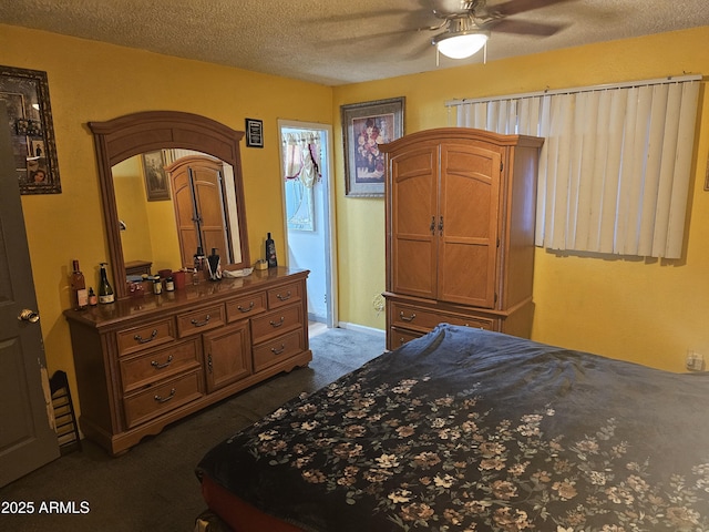 bedroom featuring ceiling fan, access to outside, a textured ceiling, and dark colored carpet