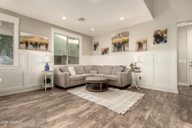 living room with dark wood-type flooring