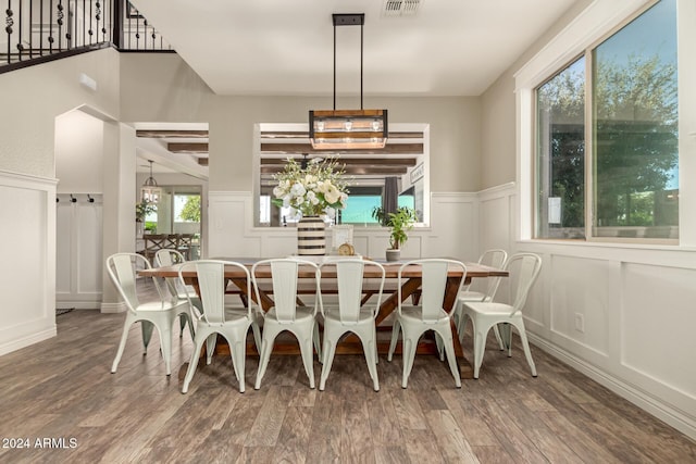 dining room with wood-type flooring