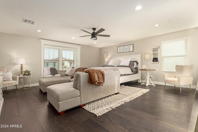 bedroom featuring ceiling fan and dark wood-type flooring