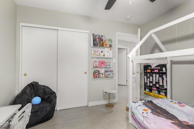 bedroom featuring a closet and a ceiling fan