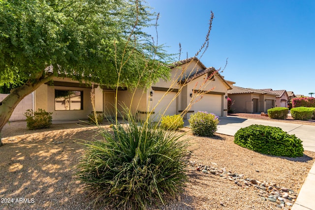 view of front of home with a garage