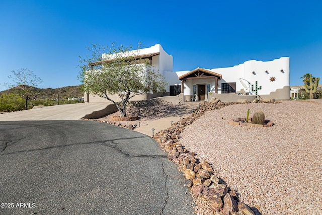 view of front of home with stucco siding