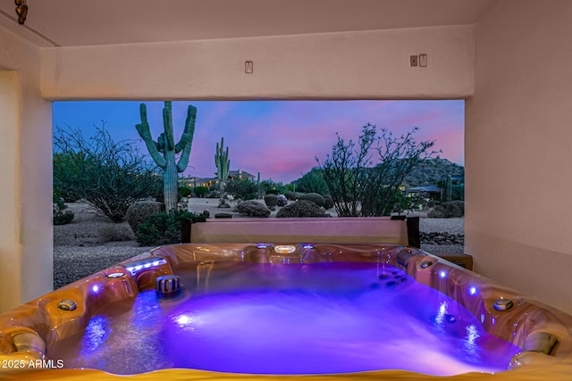 view of pool featuring a hot tub