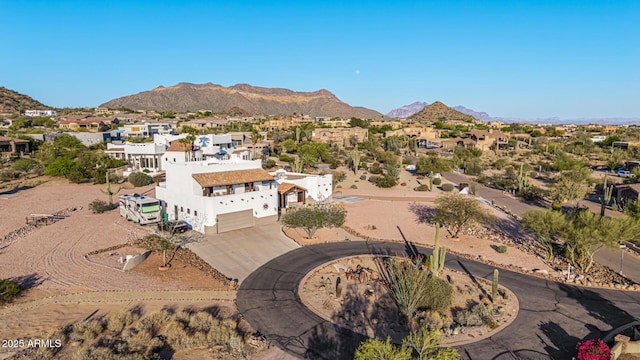 bird's eye view featuring a mountain view and a residential view