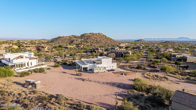 bird's eye view with a residential view and a mountain view