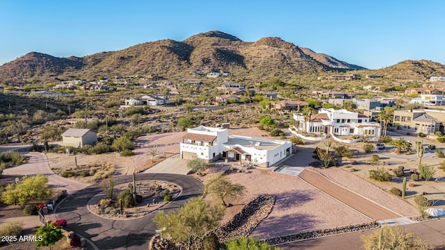 drone / aerial view featuring a mountain view and a residential view