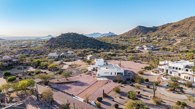 birds eye view of property featuring a mountain view and a residential view