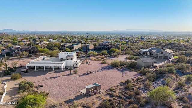 birds eye view of property with a residential view and a mountain view