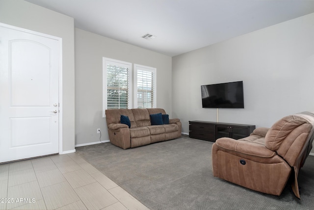 living room with light colored carpet