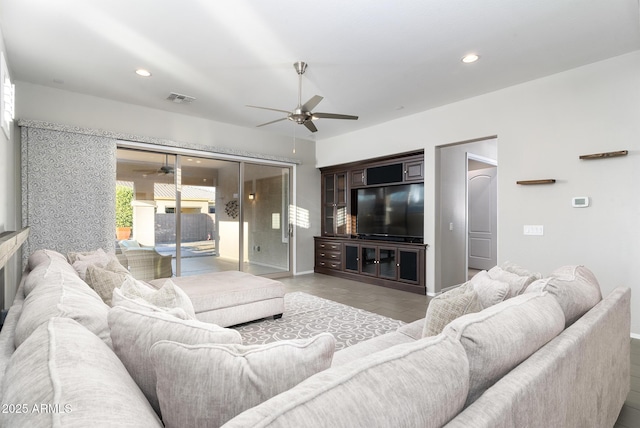 living room featuring ceiling fan