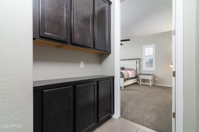 interior space featuring light colored carpet