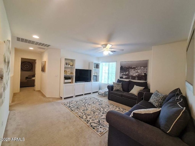 living area featuring recessed lighting, visible vents, light carpet, and a ceiling fan