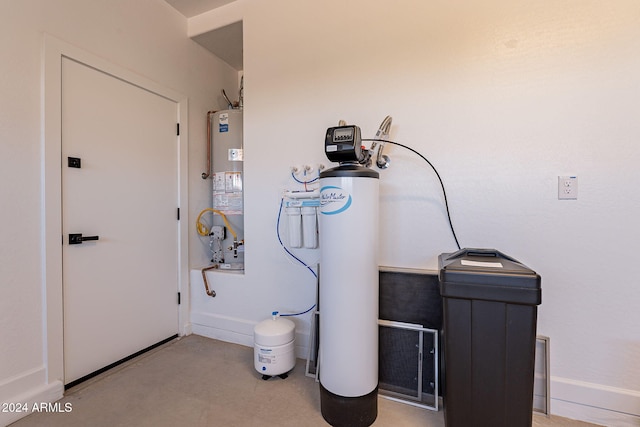 utility room with gas water heater