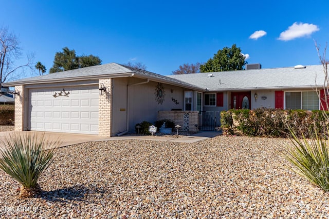 single story home featuring a garage