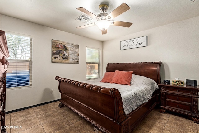 3032 W Red Fox Rd, Phoenix, AZ 85083 - tiled bedroom with baseboards and a ceiling fan
