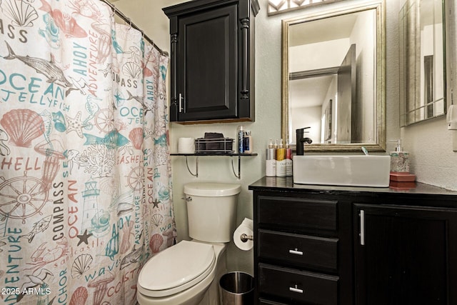 3032 W Red Fox Rd, Phoenix, AZ 85083 - full bathroom with toilet, vanity, a textured wall, and a shower with curtain