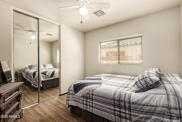 3032 W Red Fox Rd, Phoenix, AZ 85083 - bedroom featuring a closet, wood finished floors, and ceiling fan
