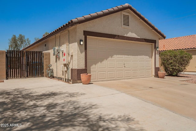 3032 W Red Fox Rd, Phoenix, AZ 85083 - garage with a gate and concrete driveway